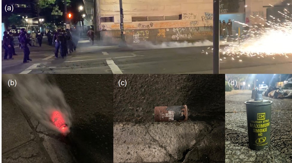 这是一组4张图片。第一张图片显示左边是国土安全部官员，右边是滚滚浓烟。他们站在十字路口。下面三张图片是HC罐在人行道上的特写，前两张已经被使用过并且烧焦了。